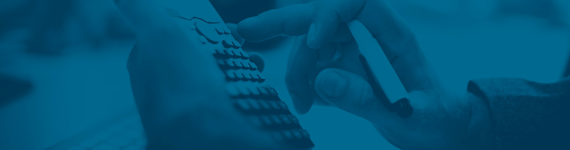 A closeup view of a person holding a calculator