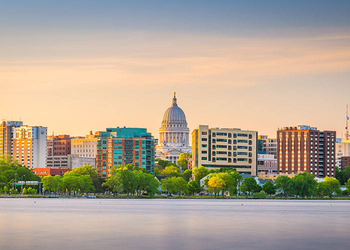 The Madison, WI skyline looking over the lake